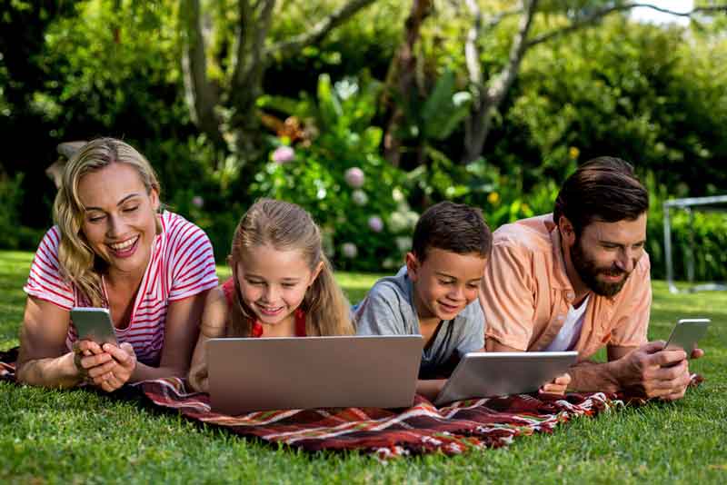 Family using smartphones